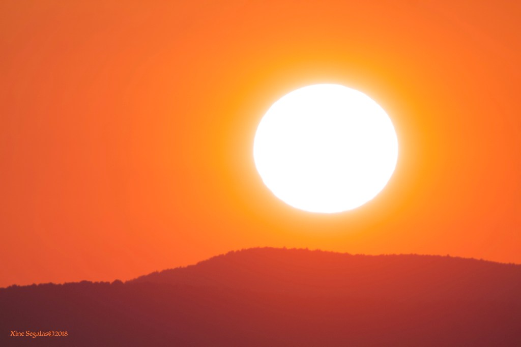 Sunset July 4, 2018 over the mountains in Hebron, New Hampshire